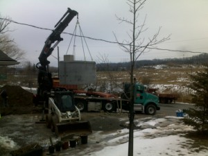 2 Picking up cistern with Crane truck
