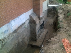 1 Excavate to Footing to expose wall