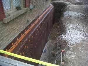 3 New reinforced wall against old basement with membrane for waterproofing